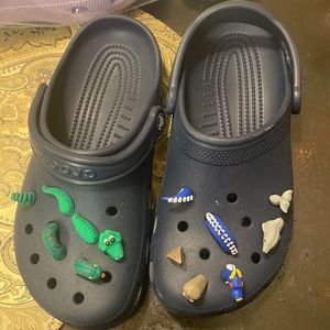 Never worn blue crocs with charms